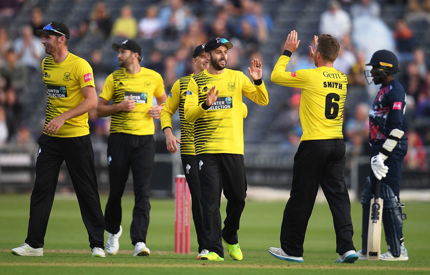 Jack Taylor celebrates after his direct hit put an end to Alex Blake's innings