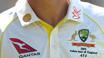 What is the yellow symbol the Australian players have on their shirt collars in this Ashes series?