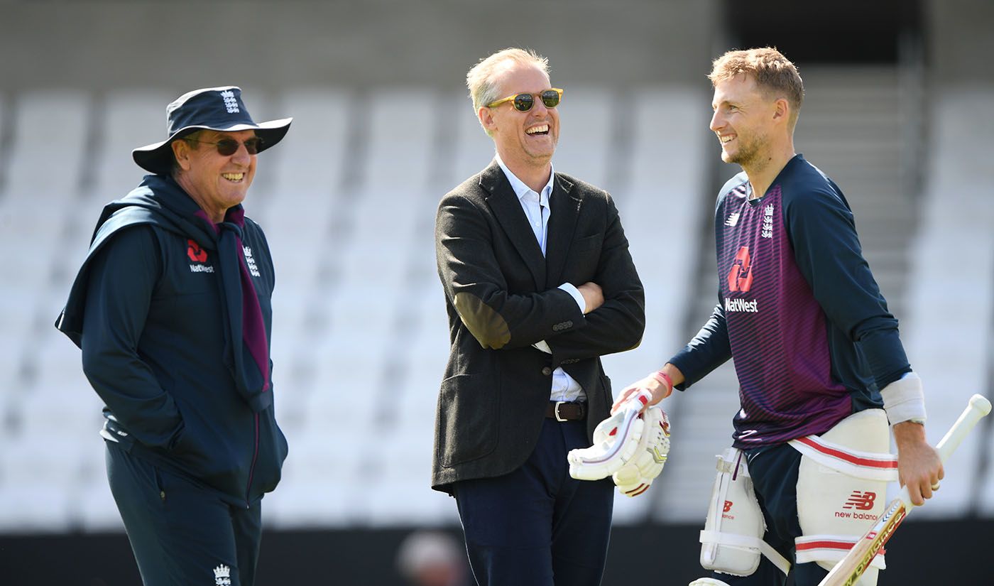 Joe Root shares a laugh with Ed Smith and Trevor Bayliss