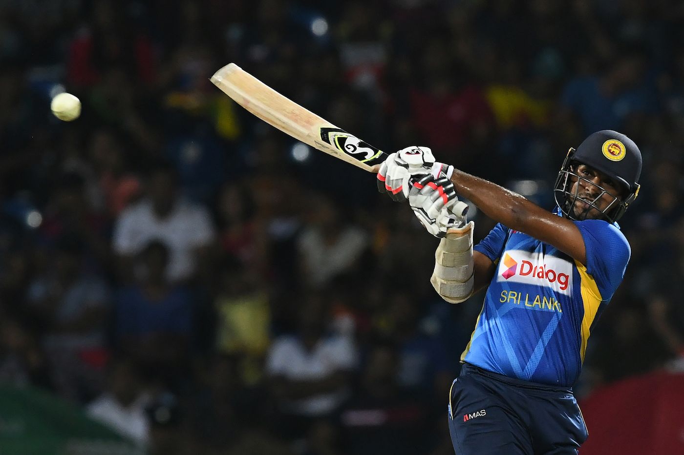 Shehan Jayasuriya smashes the ball into the leg side