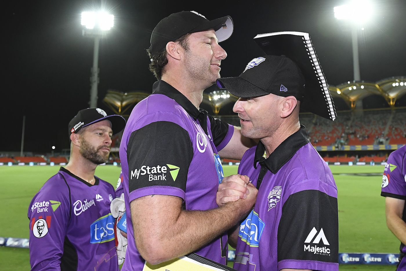 Adam Griffith and Jeff Vaughan celebrate a win for the Hobart Hurricanes