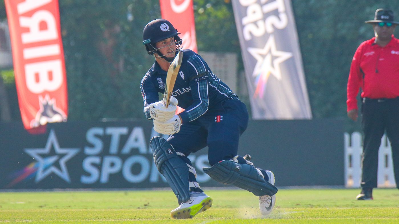 Tom Sole completes a scoop over fine leg
