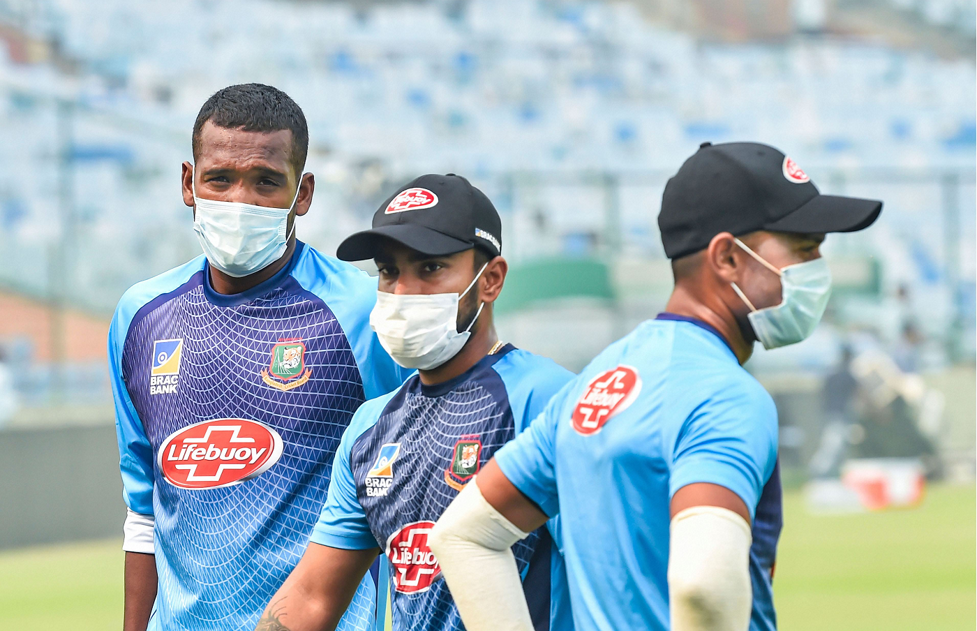 Al-Amin Hossain, Liton Das and Abu Hider wearing face masks during a practice session