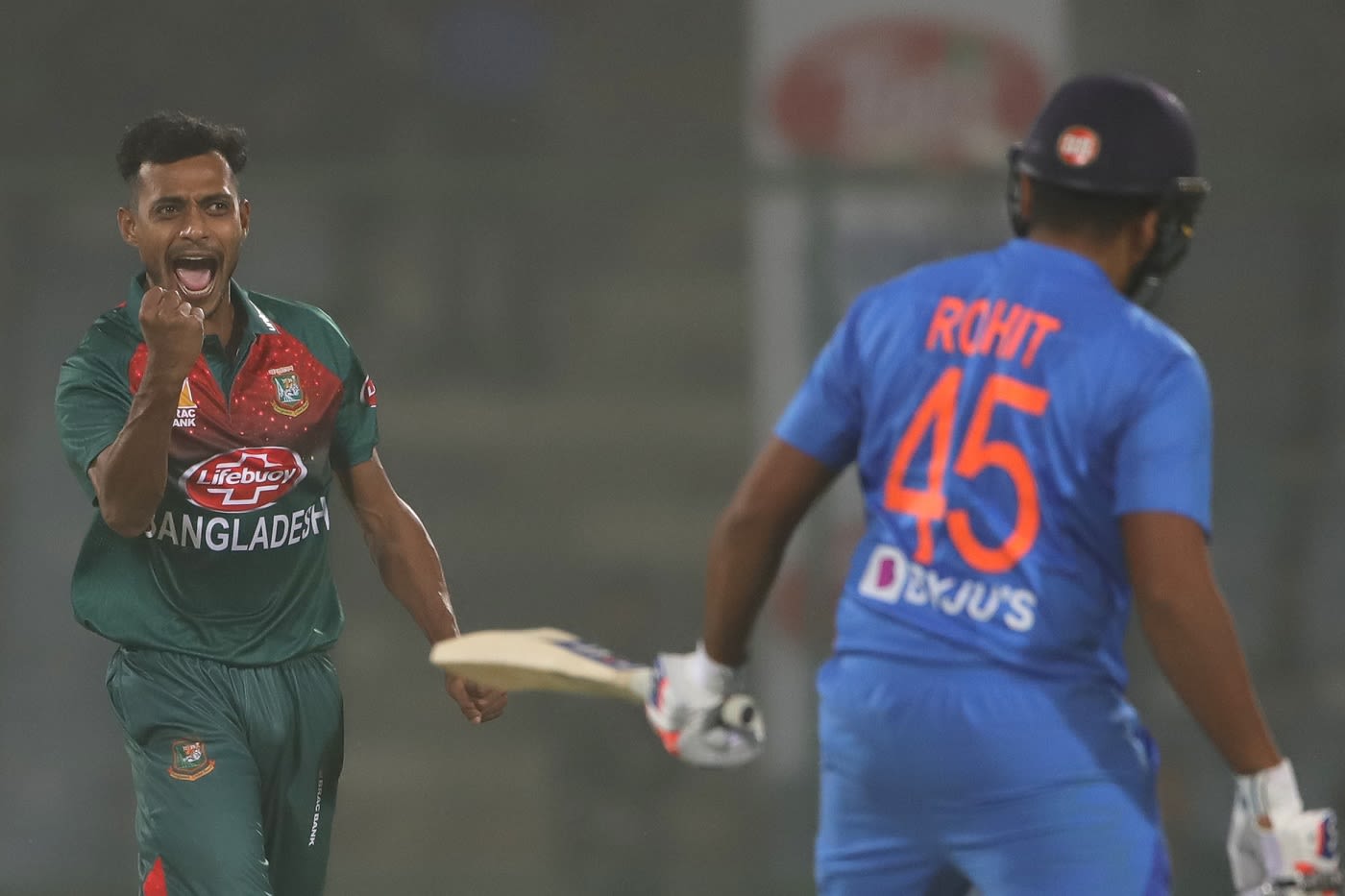 Shafiul Islam celebrates Rohit Sharma's wicket