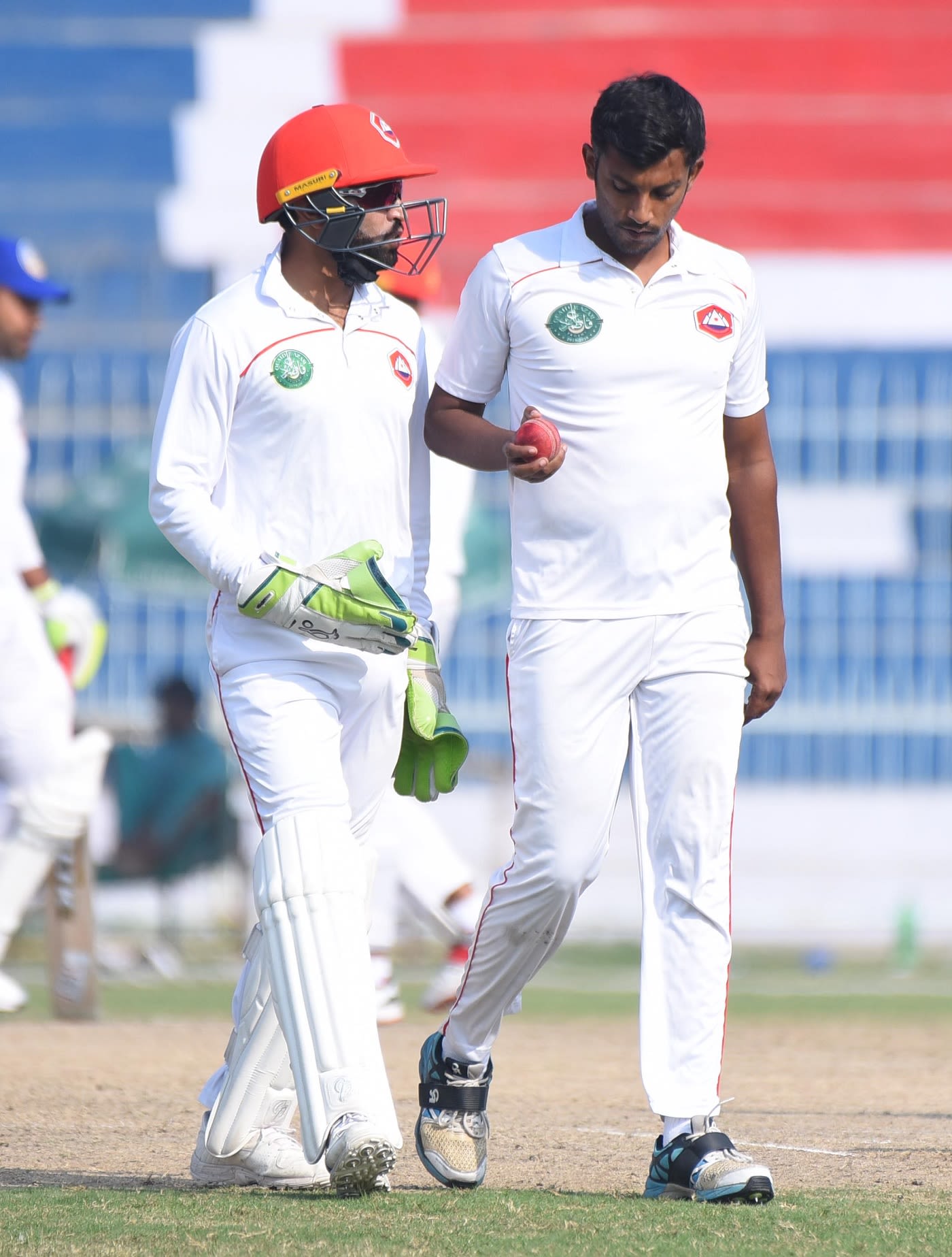 Raza Hasan gets instructions from Jamal Anwar
