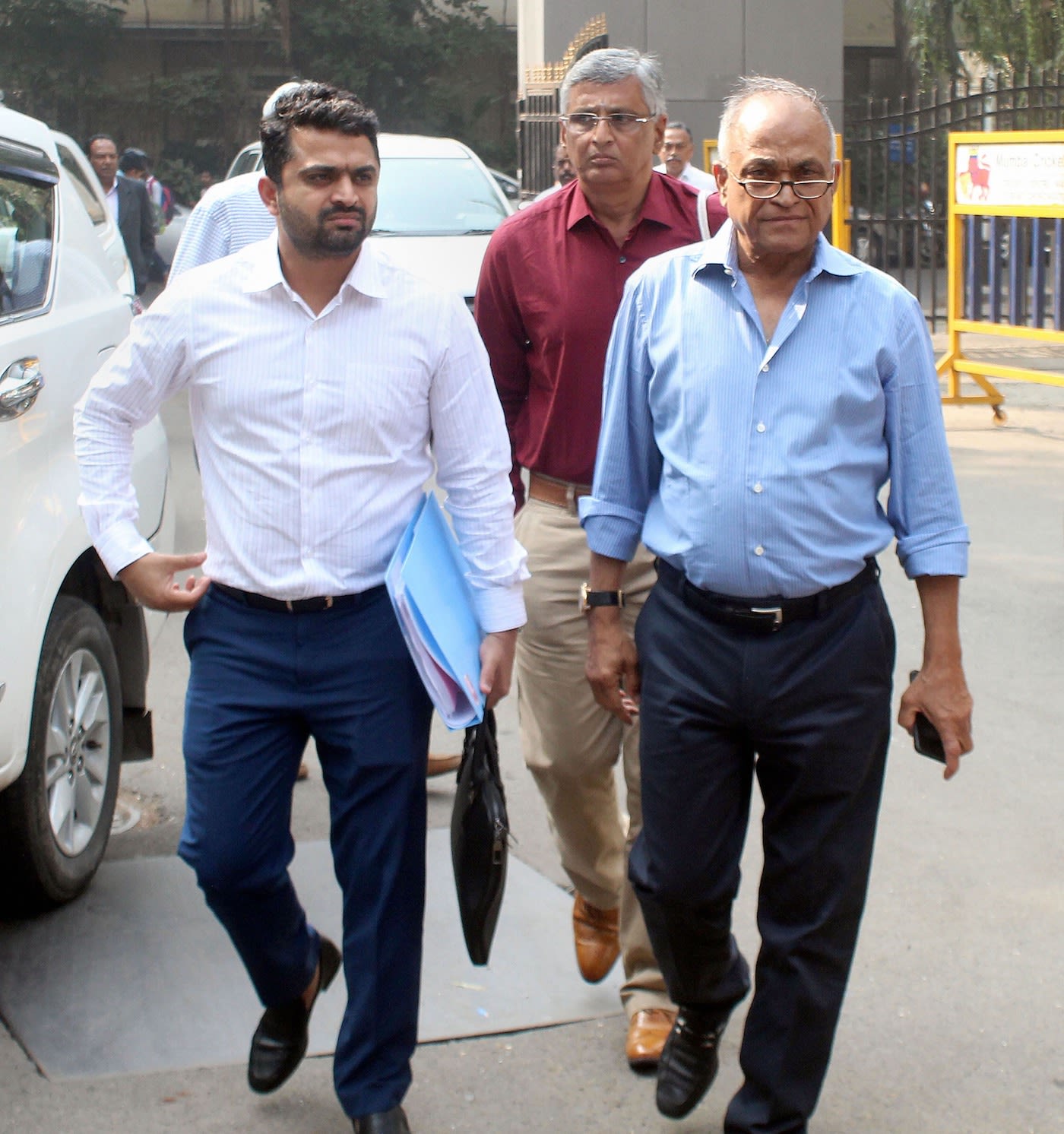 Jaydev Shah and Niranjan Shah arrive at the BCCI office