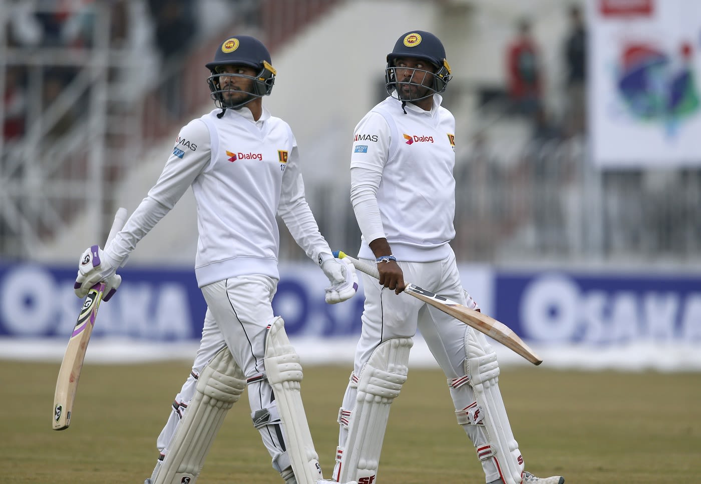 Dhananjaya de Silva and Dilruwan Perera walk off