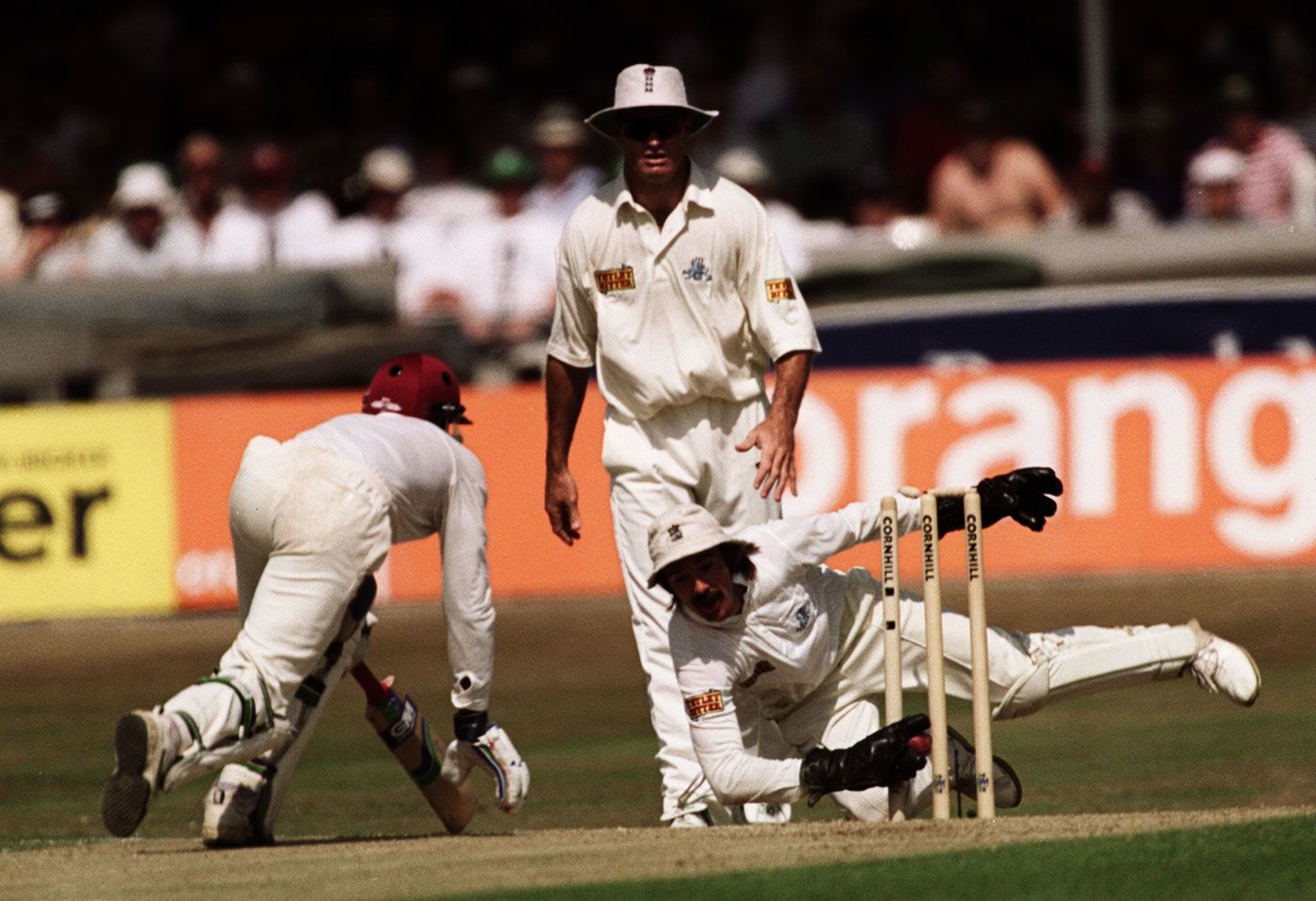 Jack Russell attempts to stump Keith Arthurton