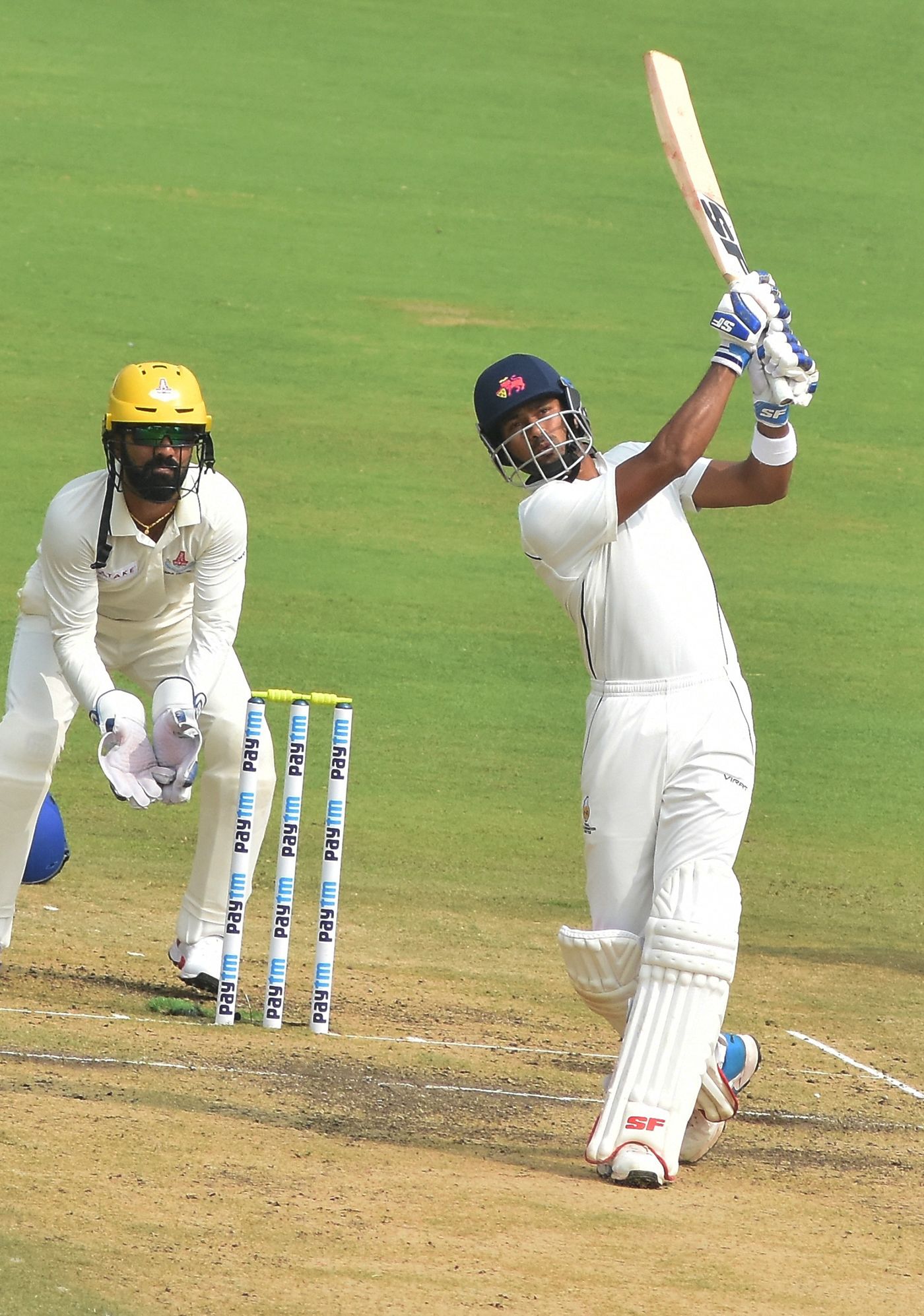 Aditya Tare launches one down the ground