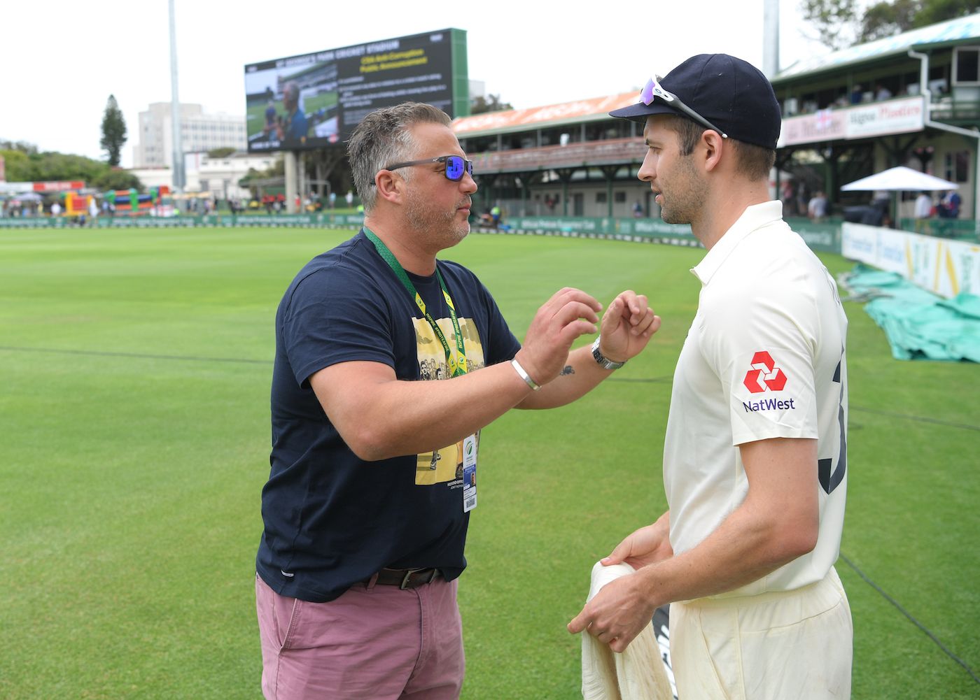 Mark Wood listens to Darren Gough
