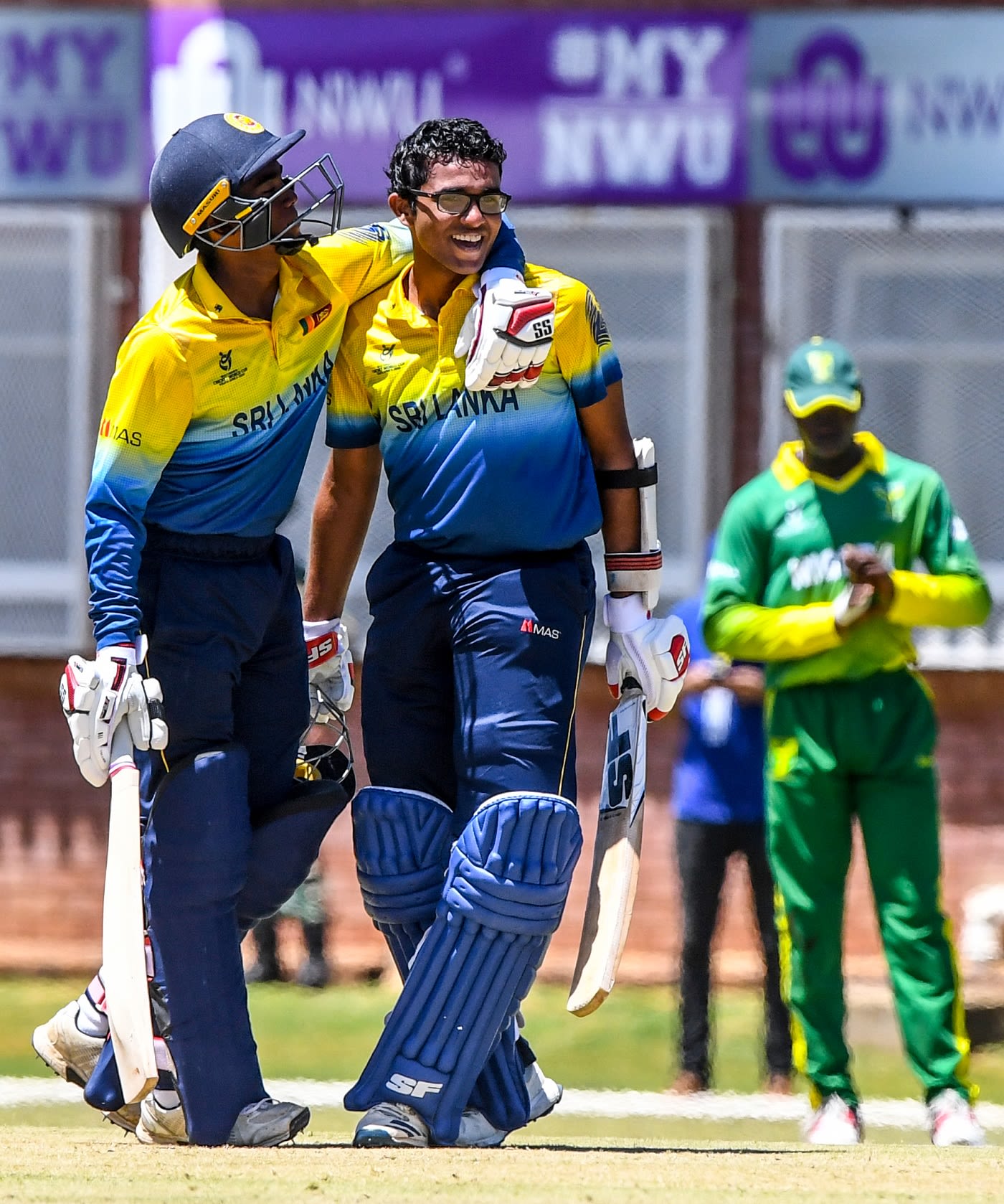 Ravindu Rasantha celebrates his century
