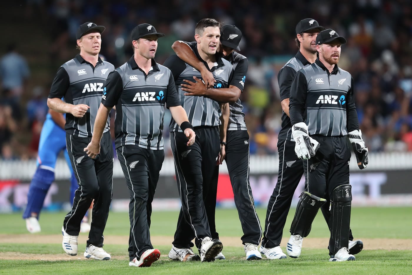Hamish Bennett gets a big hug from Ish Sodhi