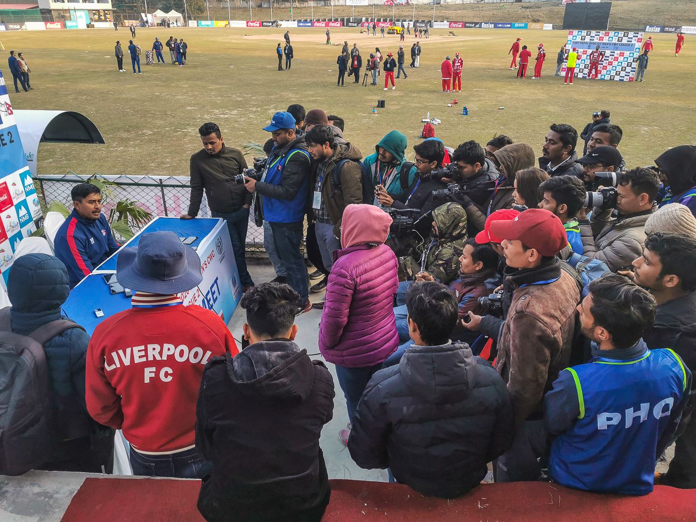 Nepal captain Gyanendra Malla interacts with a sizable local press contingent after the match