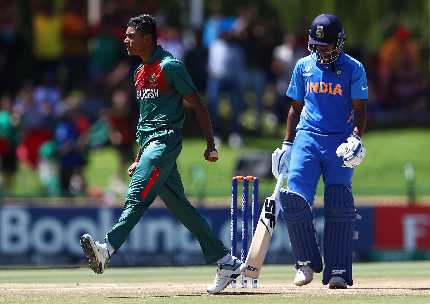 Avishek Das celebrates Divyaansh Saxena's wicket