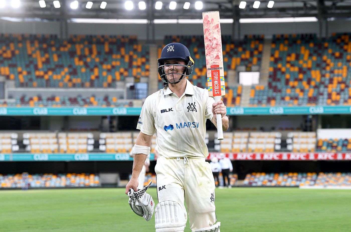 Seb Gotch walks off after his second Shield hundred