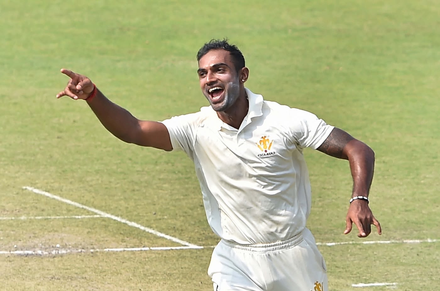 Abhimanyu Mithun celebrates a wicket