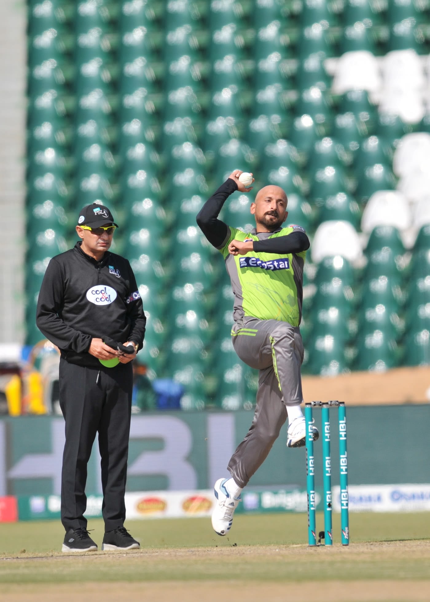 Dilbar Hussain bowls