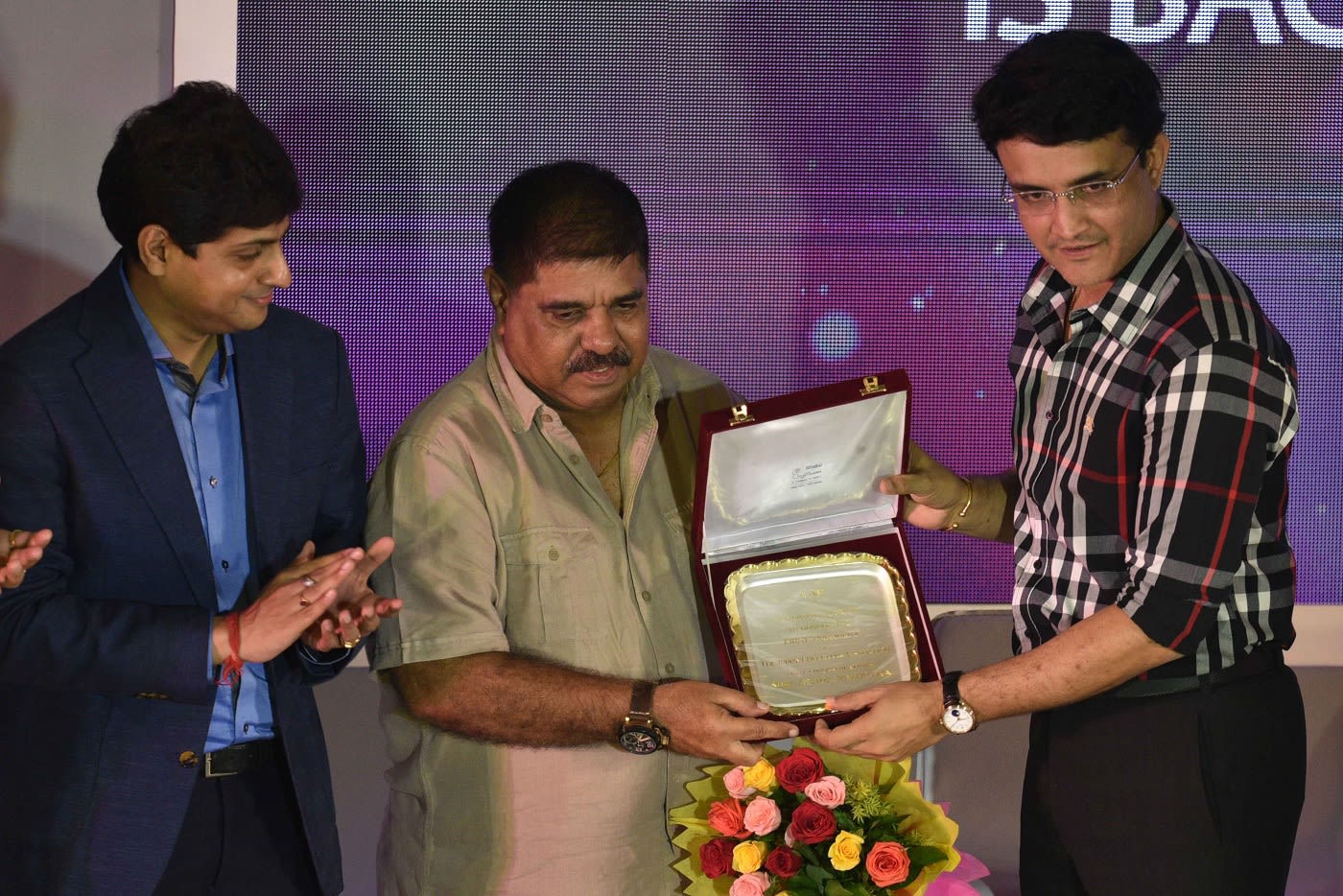 Ashok Malhotra is felicitated by BCCI President Sourav Ganguly