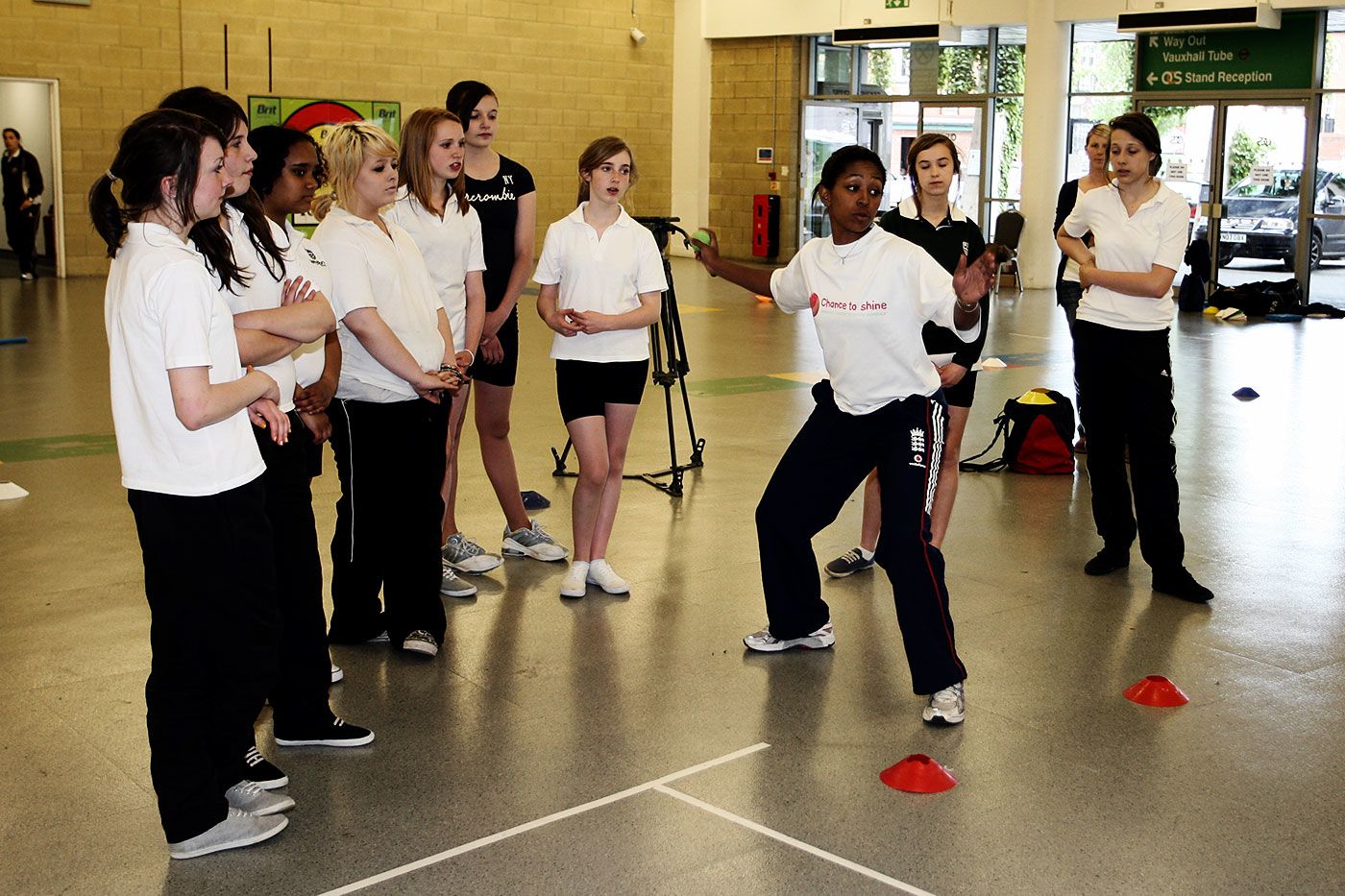 Ebony Rainford-Brent gives a coaching lesson to schoolgirls in Lambeth Hall, London