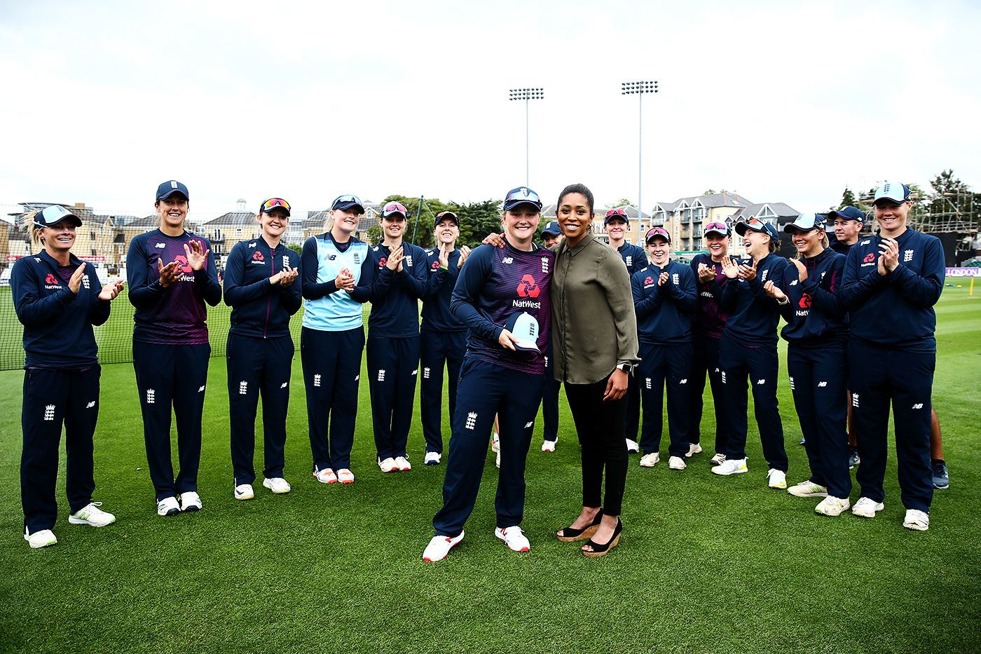 Bryony Smith gets her England cap from Ebony Rainford-Brent
