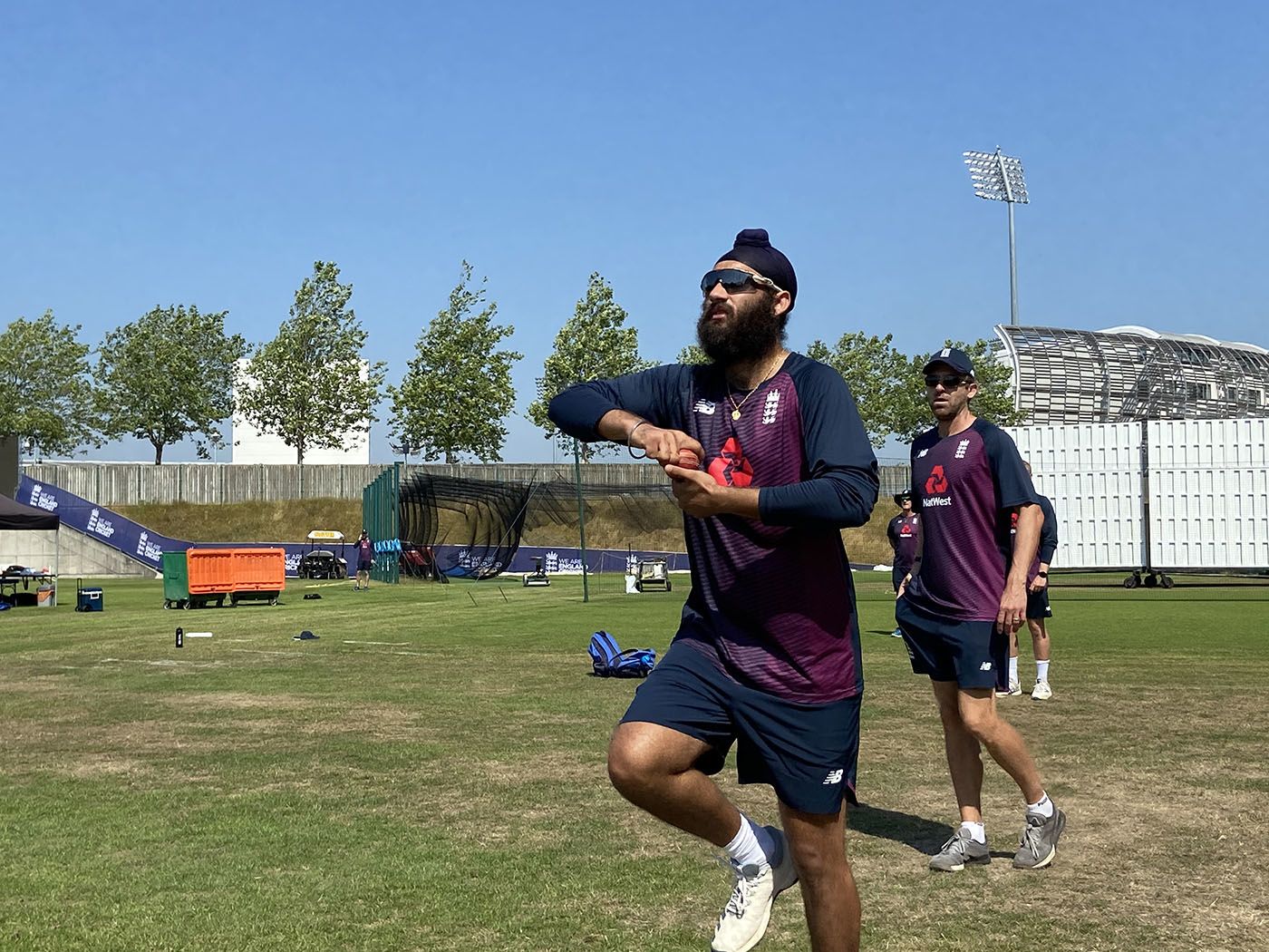 Virdi is watched by England's spin coach Richard Dawson