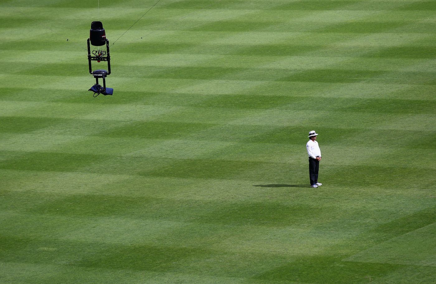 Spidercam is seen above umpire Asad Rauf