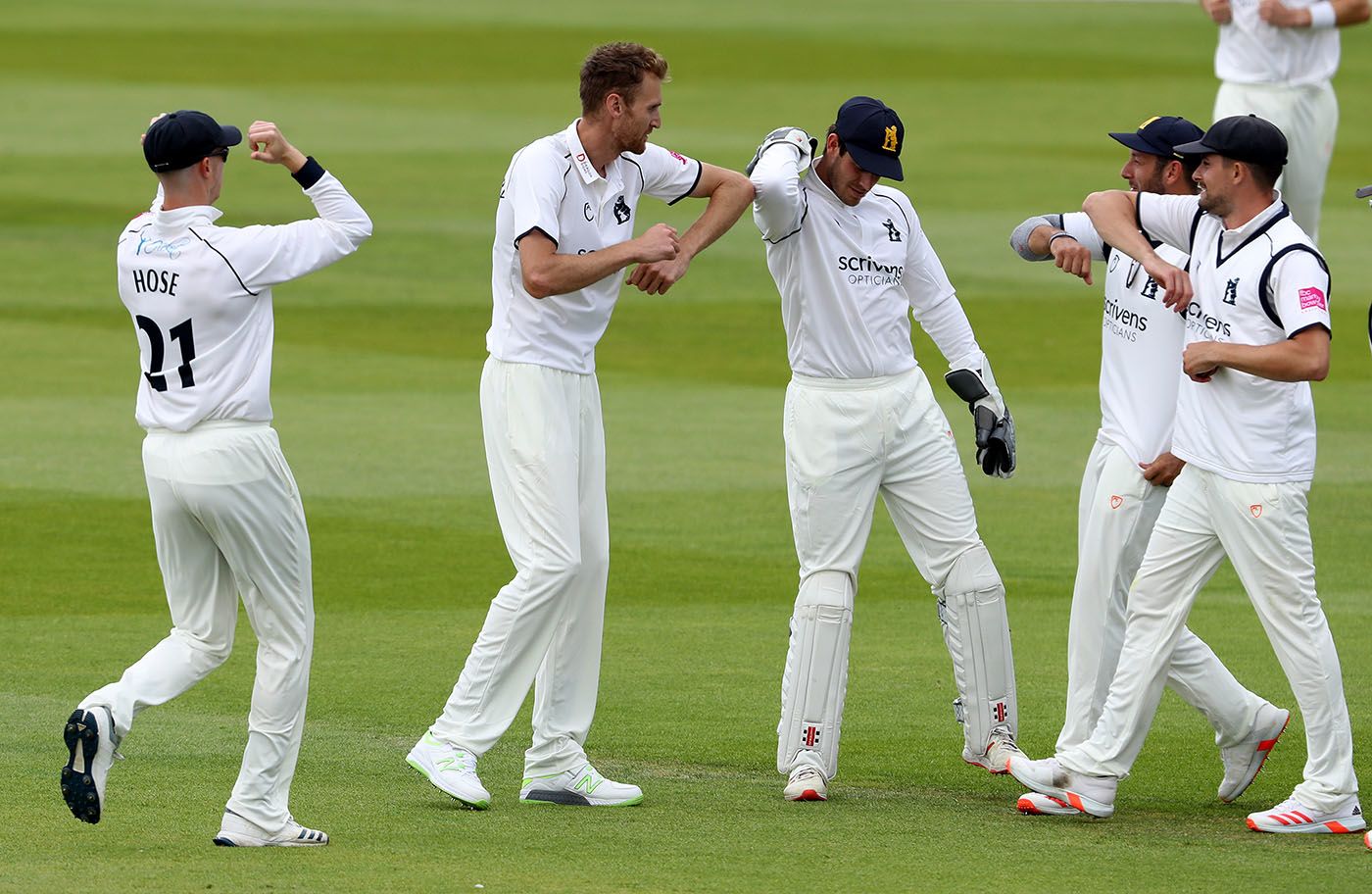 Oliver Hannon-Dalby bumps elbows with Michael Burgess
