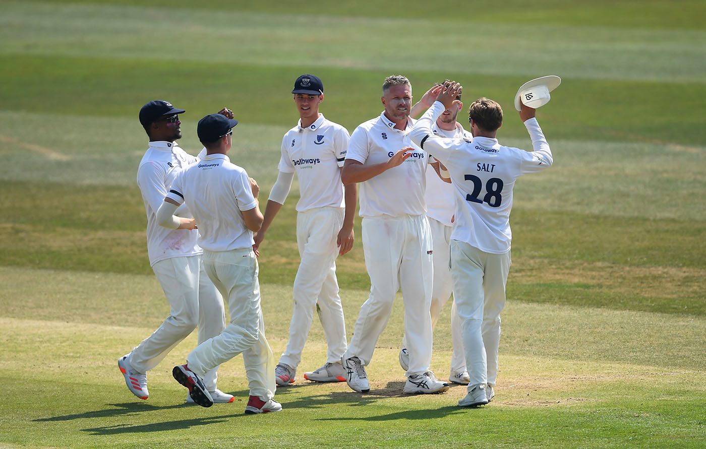 Mitch Claydon is congratulated on the making the breakthrough