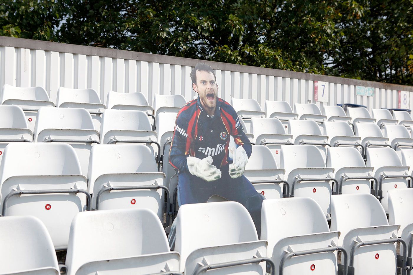 A cardboard cut-out of James Foster watches proceedings at Chelmsford