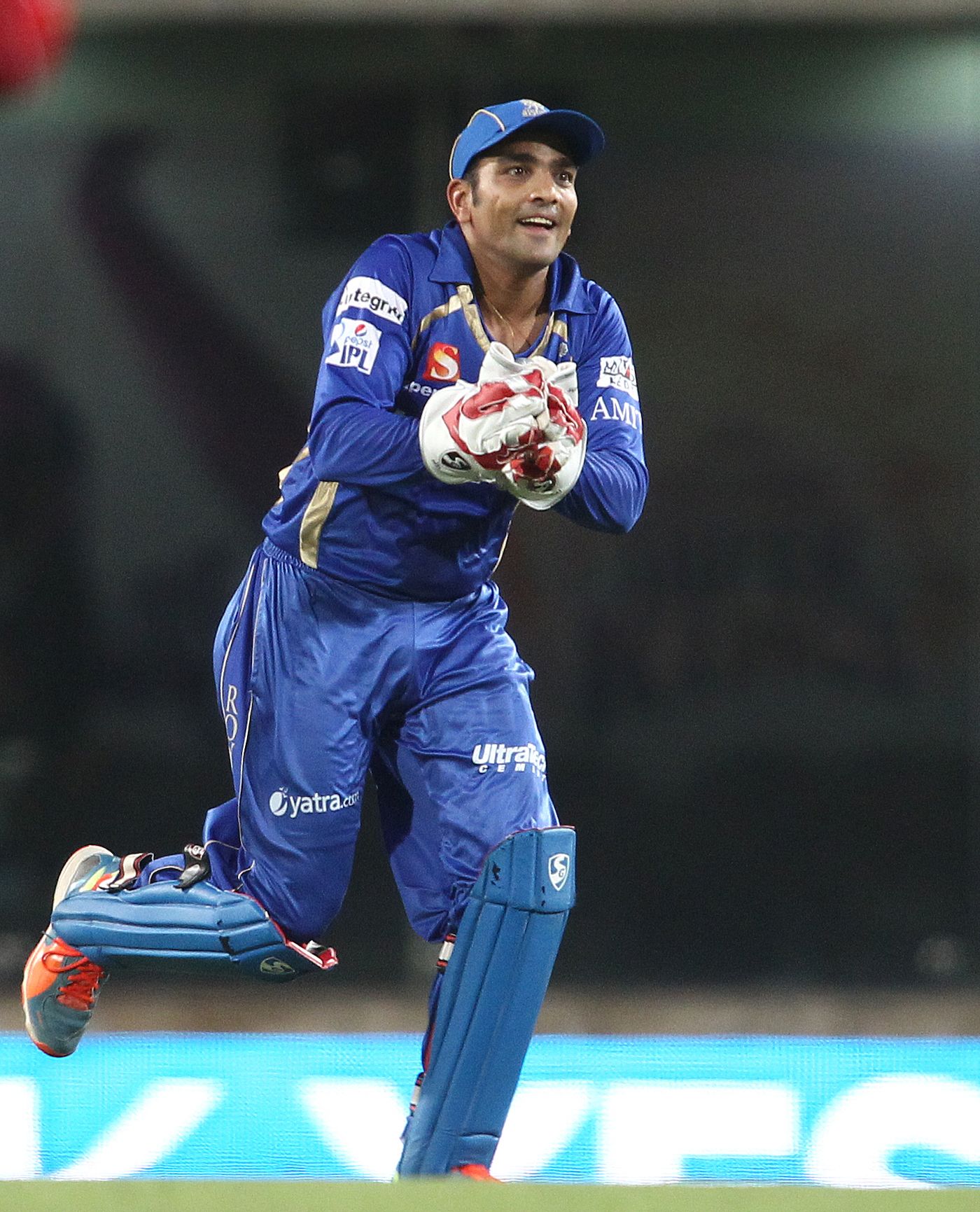 A cheerful Dishant Yagnik after taking Dwayne Smith's catch