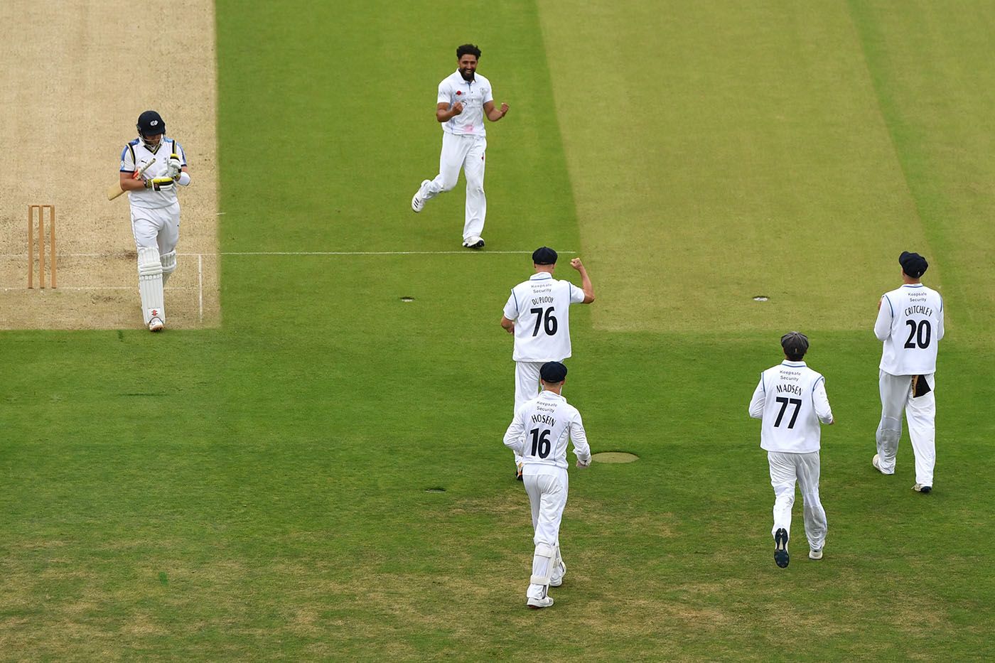 Anuj Dal celebrates his dismissal of Jonny Bairstow