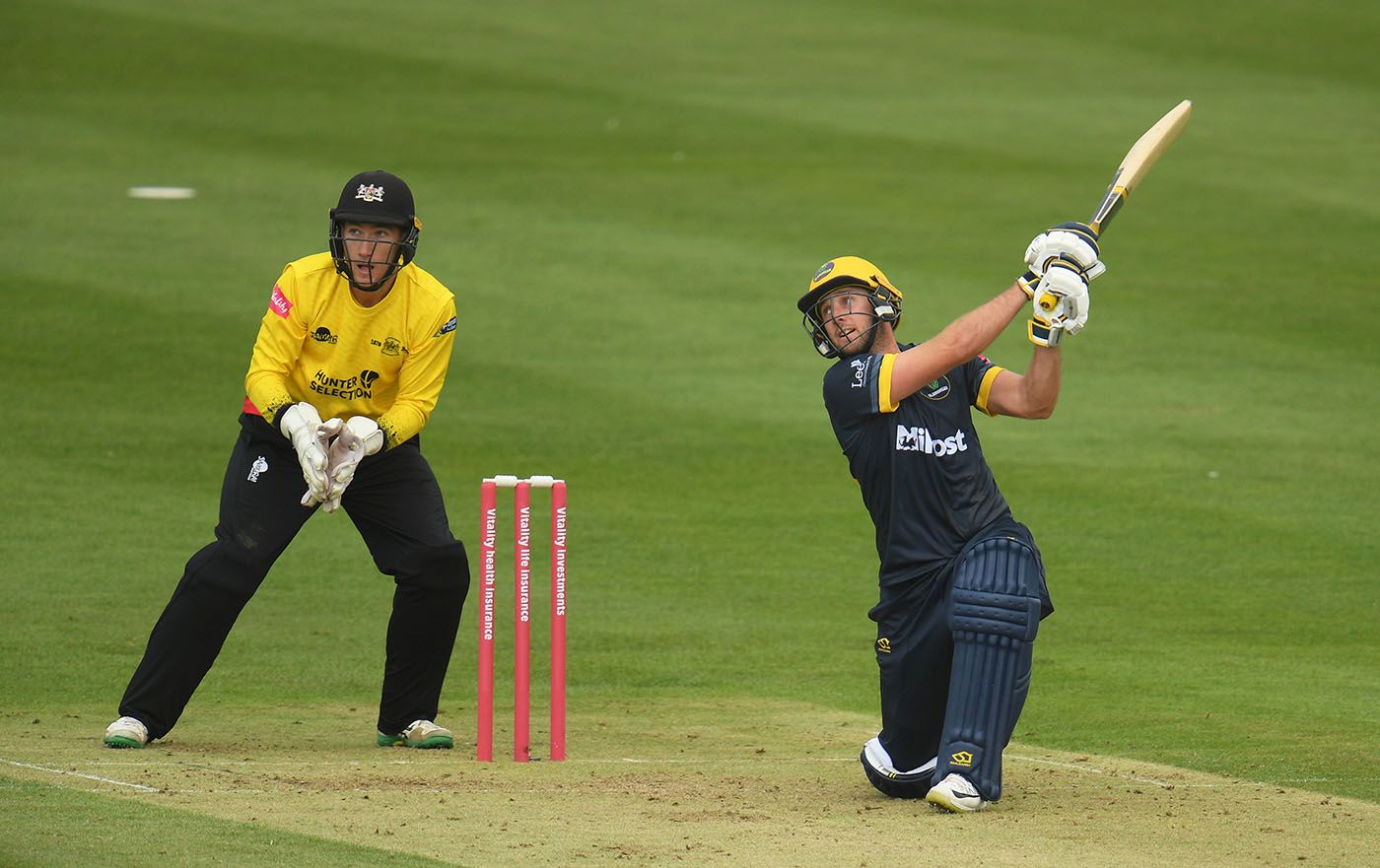 Chris Cooke goes over the off side