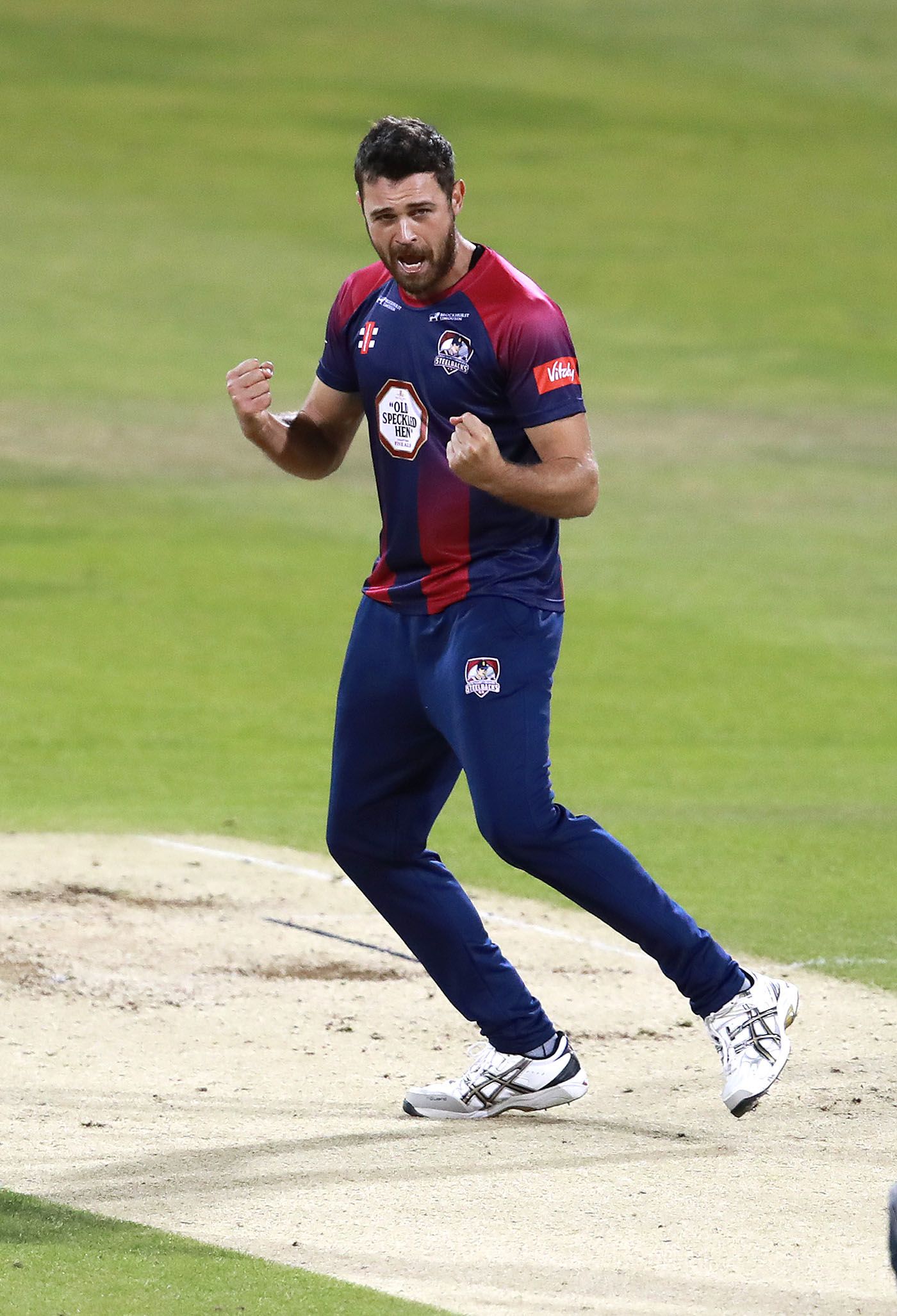 Nathan Buck celebrates a wicket