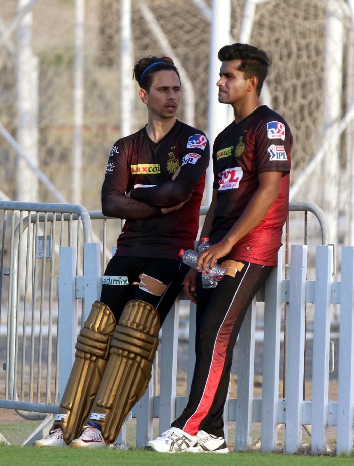 Siddesh Lad and Shivam Mavi have a chat during the KKR nets