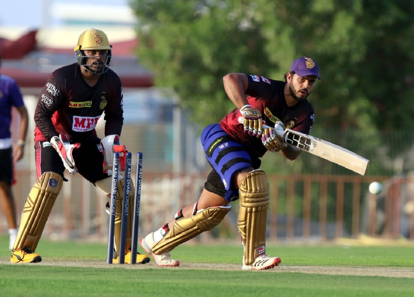 Nitish Rana plays to the leg side as Nikhil Naik looks on during a Knight Riders intra-squad game