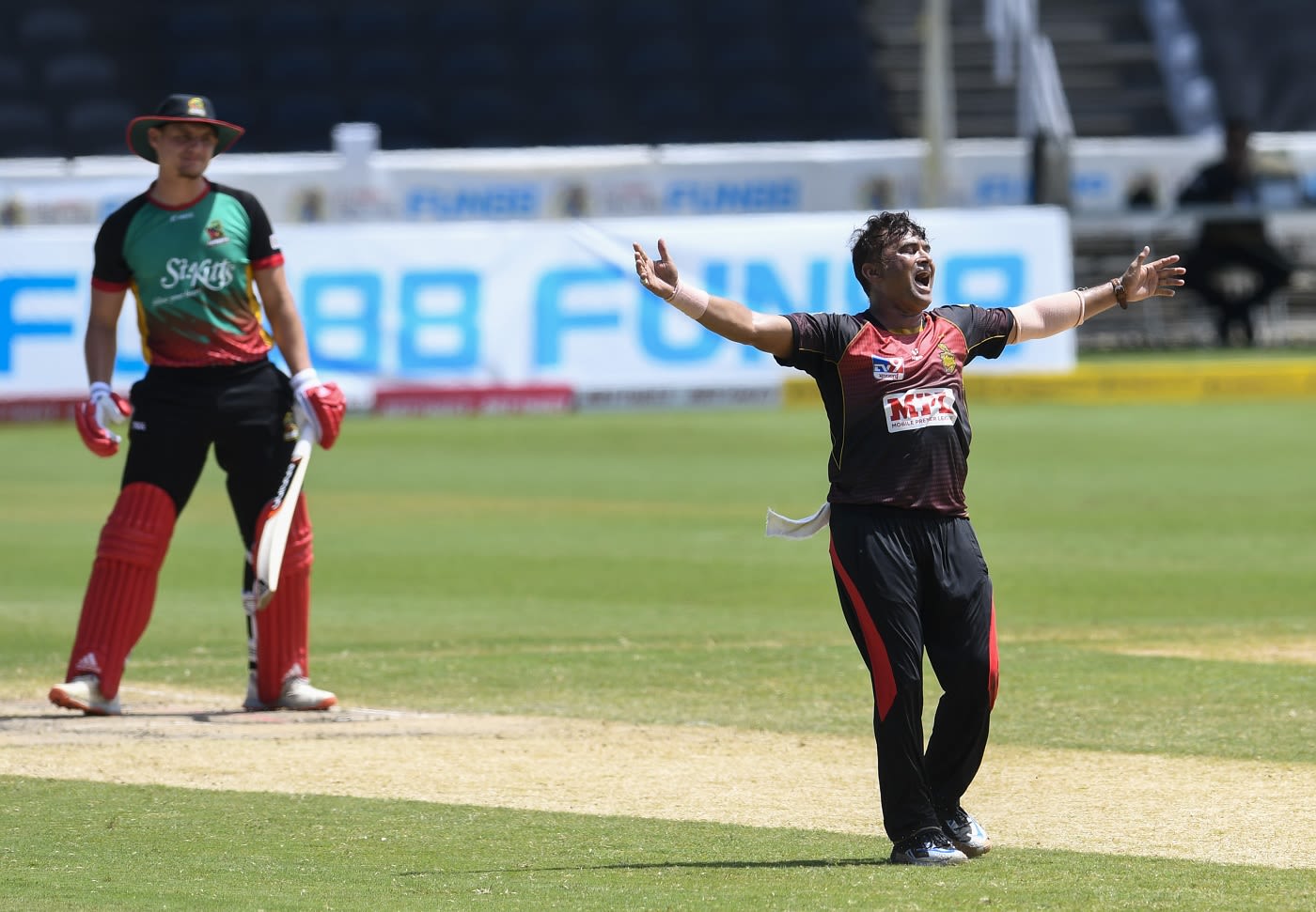 Pravin Tambe celebrates Joshua Da Silva's wicket