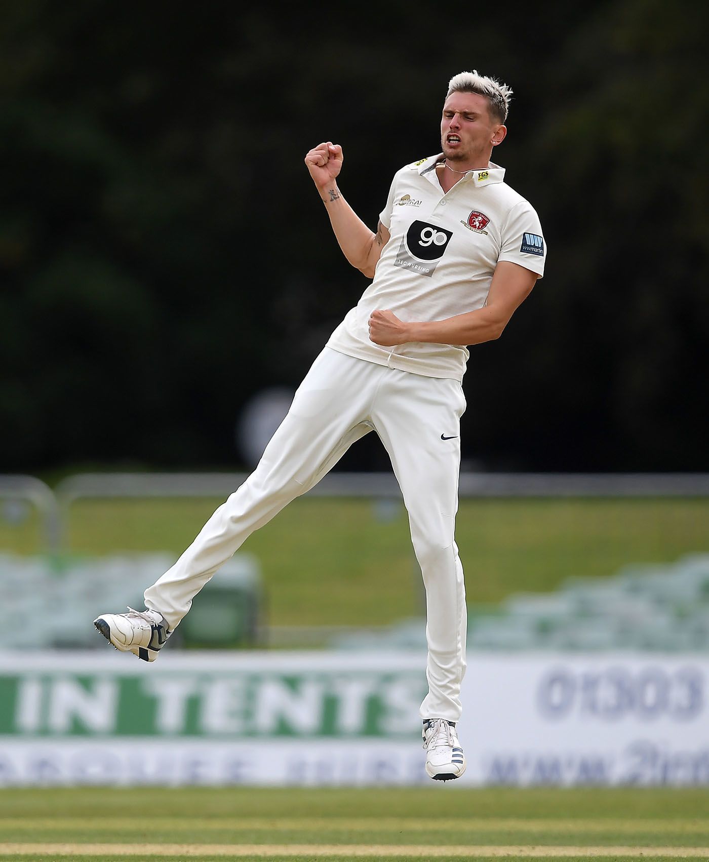 Harry Podmore leaps in celebration