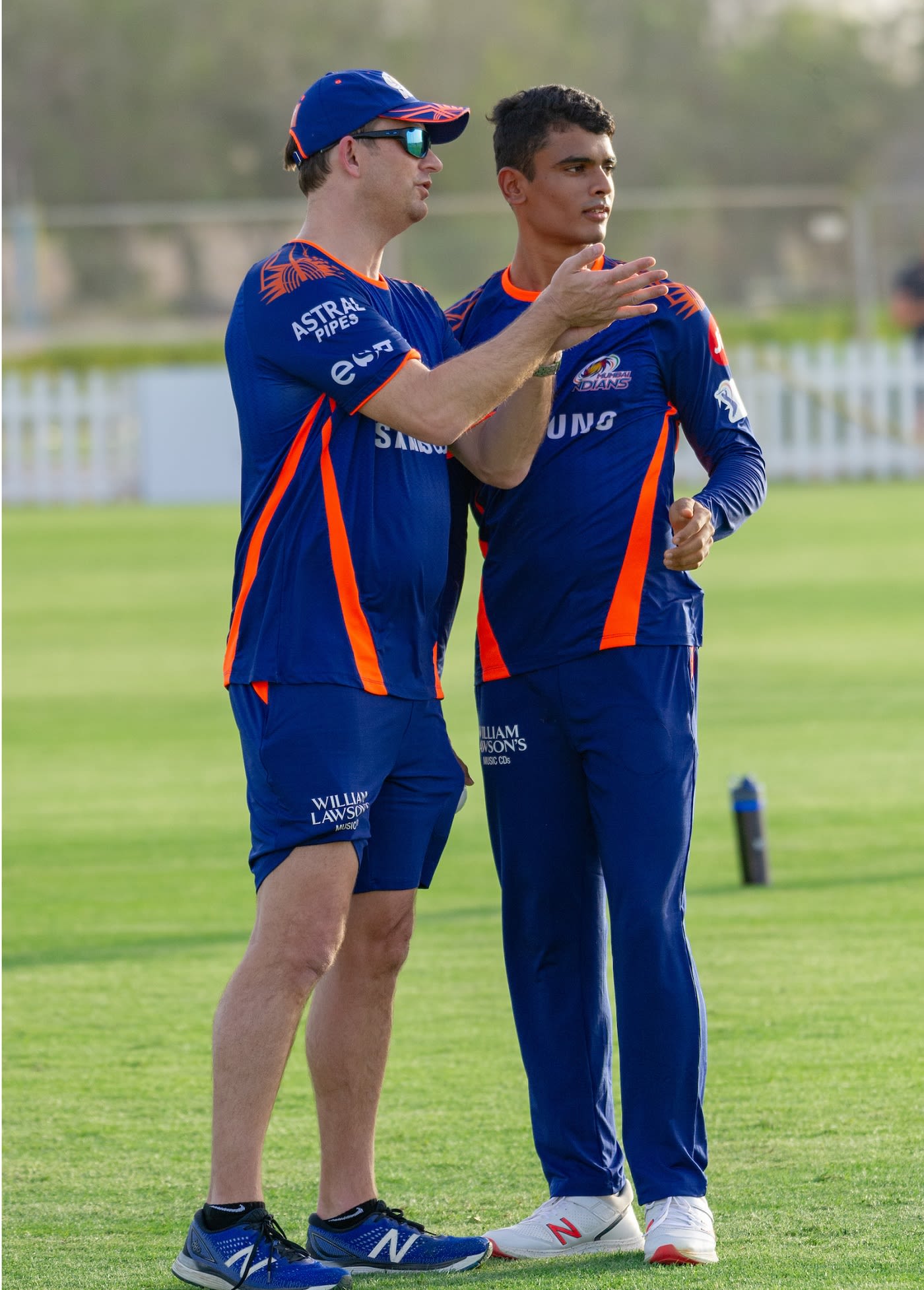 Digvijay Deshmukh gets some bowling tips from Shane Bond