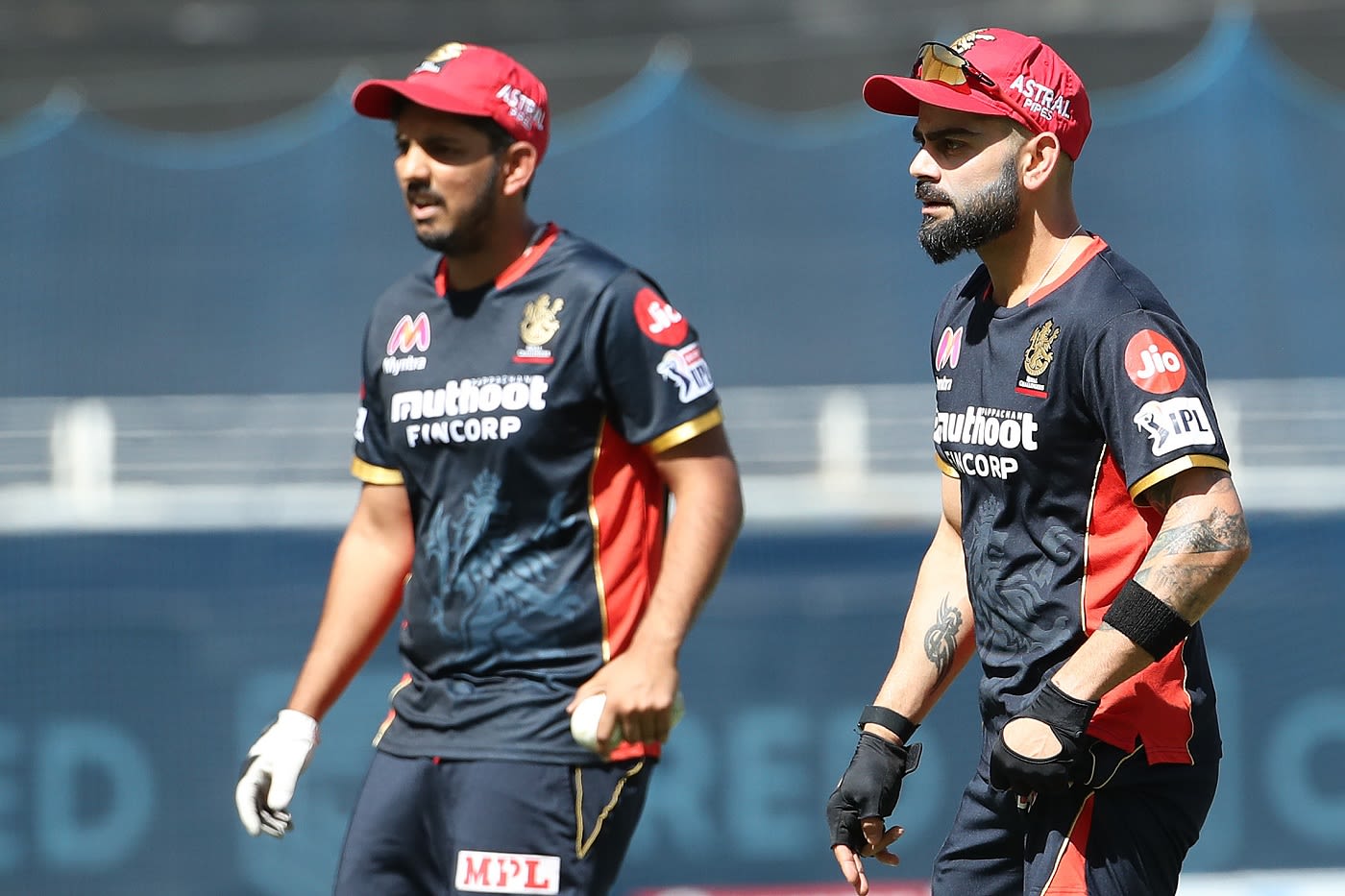 Malolan Rangarajan with Virat Kohli at a warm-up session before the match