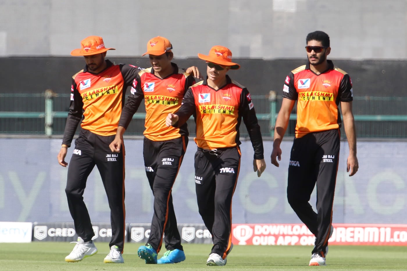 Manish Pandey, Priyam Garg, David Warner and Basil Thampi - a happy bunch after Garg's diving catch
