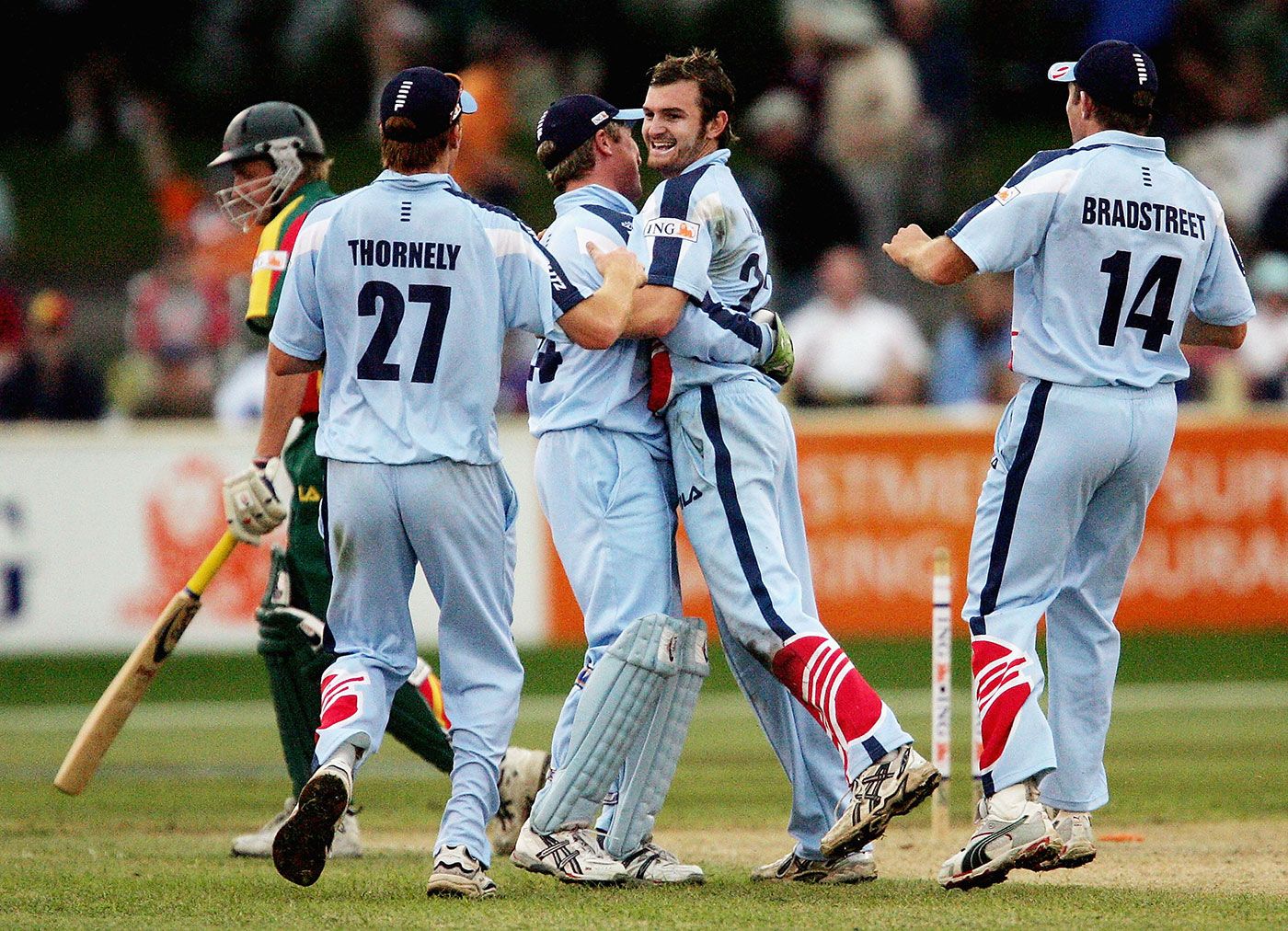 Jason Krejza celebrates a wicket