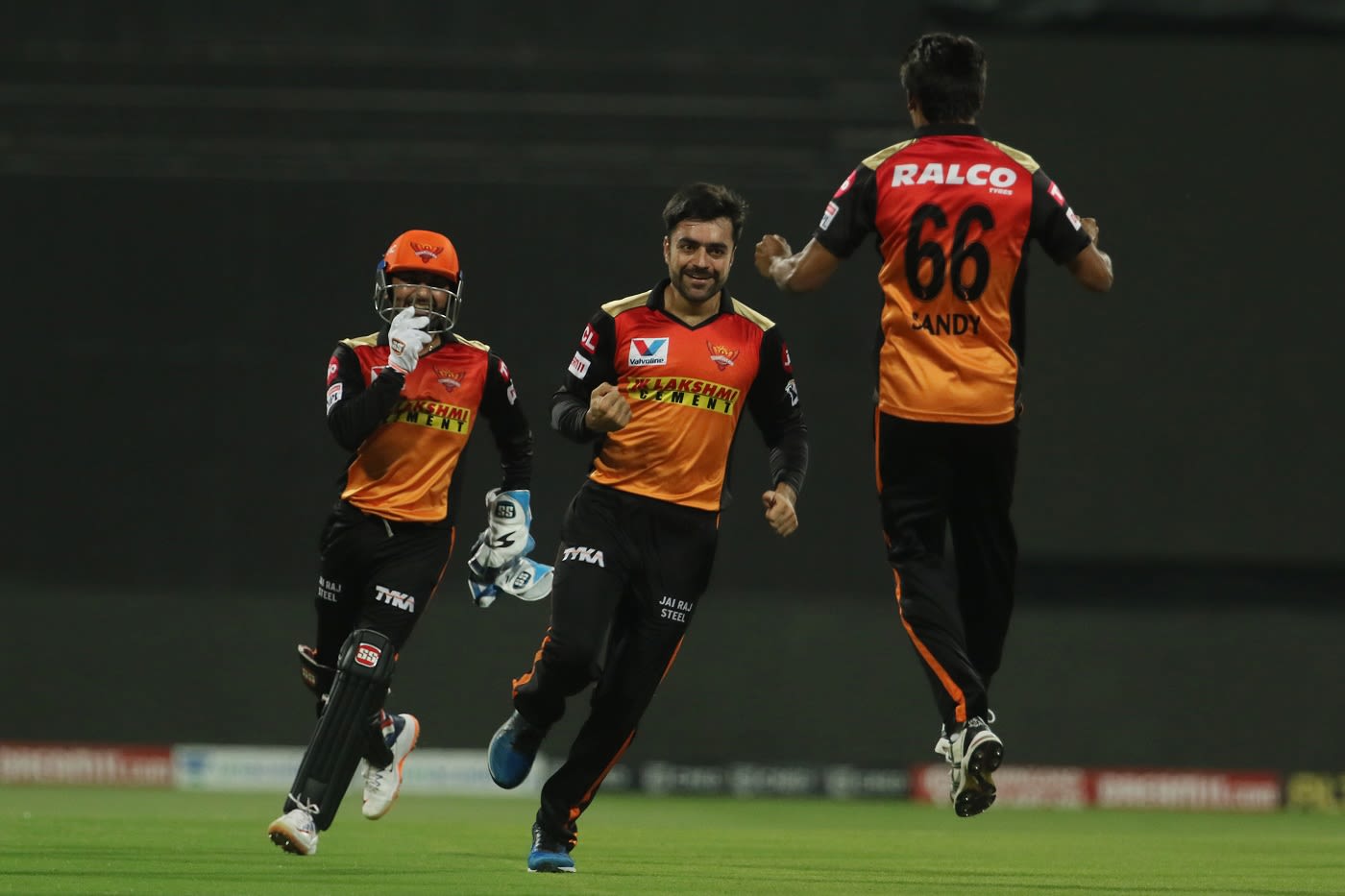 He gets wickets in the field too - a joyous Rashid Khan is all smiles after scoring a direct hit to run Moeen Ali out on a free hit