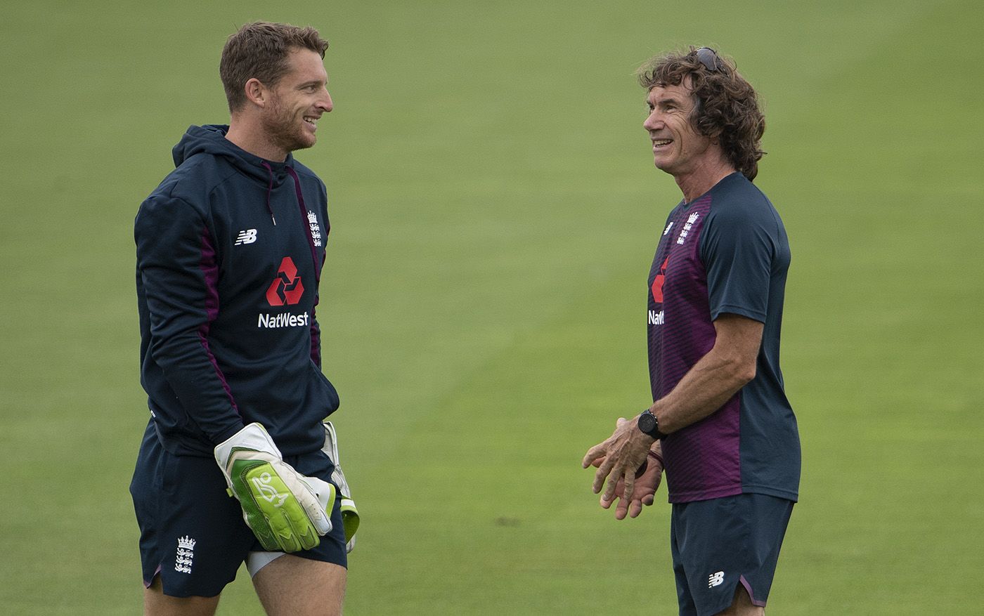 Bruce French shares a smile with Jos Buttler