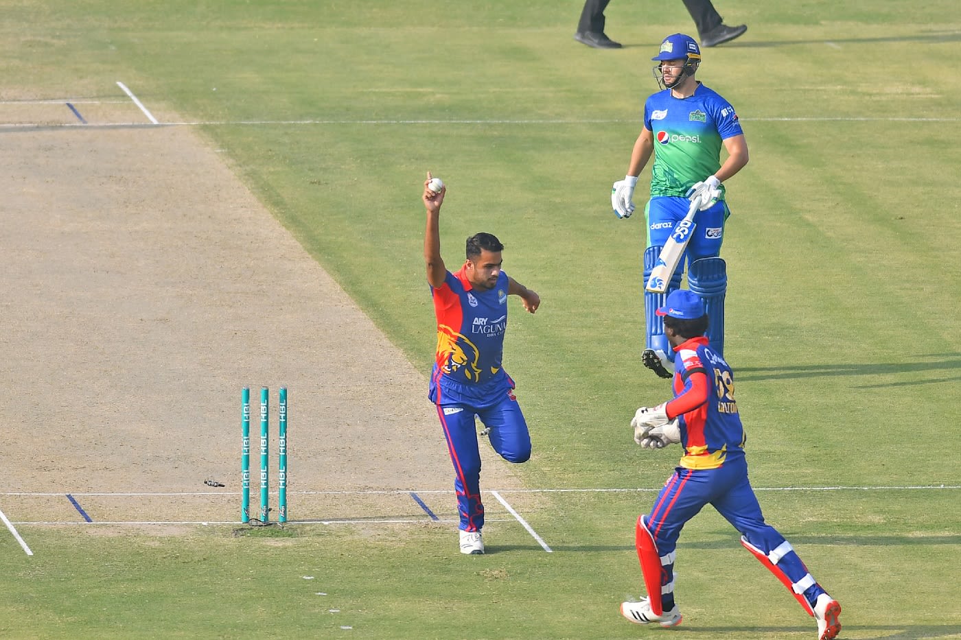 Arshad Iqbal and Chadwick Walton celebrate as Rilee Rossouw is run out