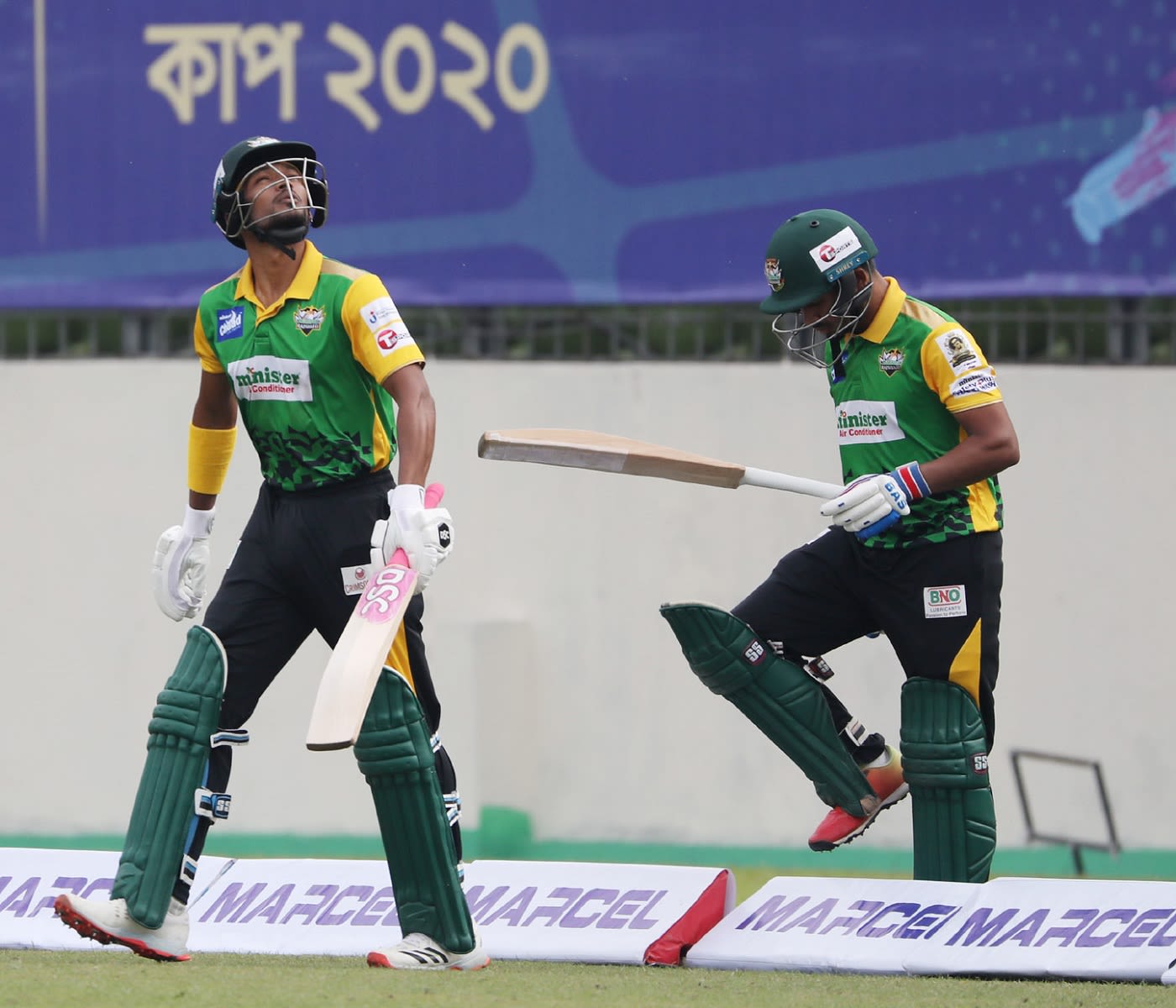 Najmul Hossain Shanto and Anisul Islam Emon walk out to bat