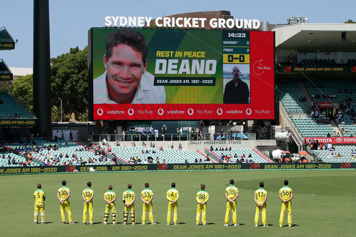The players observe a minute's silence in honour of the late Dean Jones