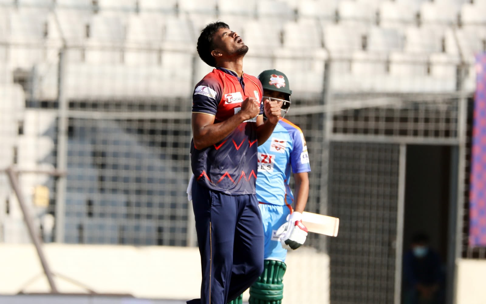 Sumon Khan celebrates Mohammed Mithun's dismissal