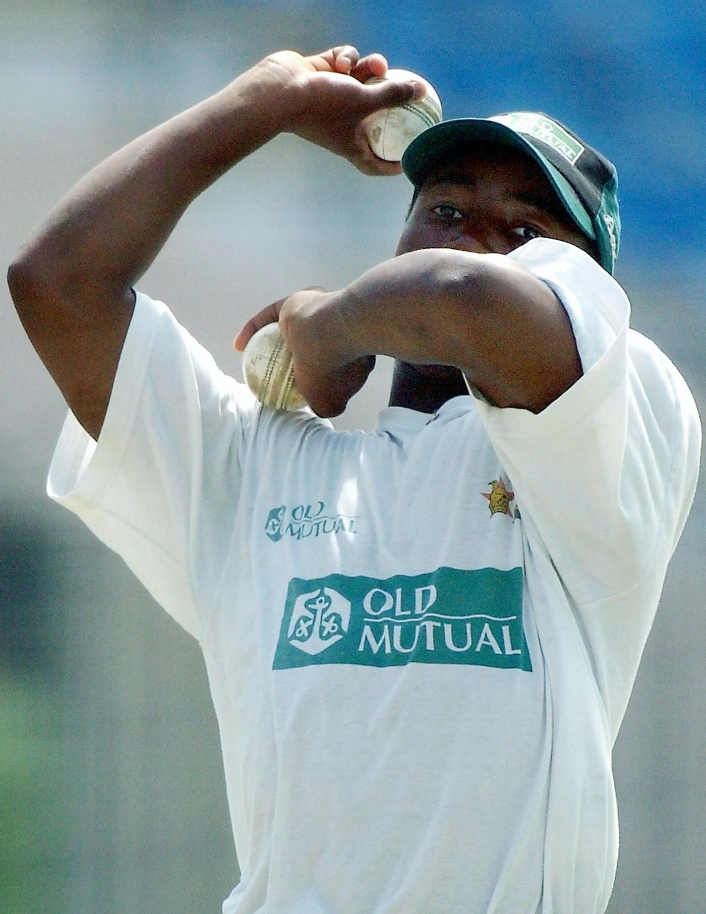 Tatenda Taibu throws the ball during a practice session