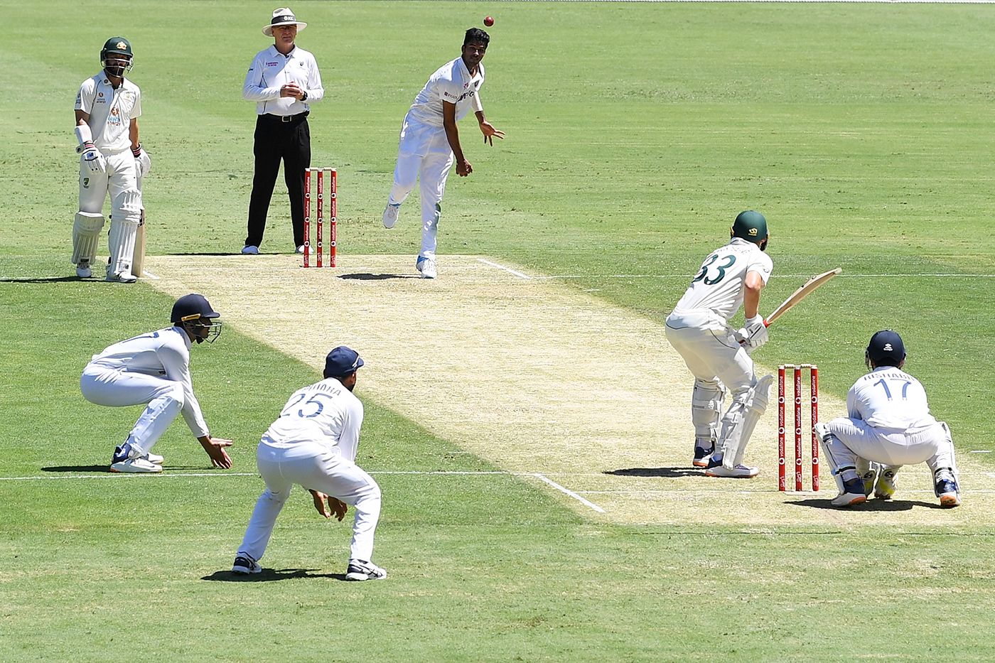 Washington Sundar bowls with the leg trap lying in wait