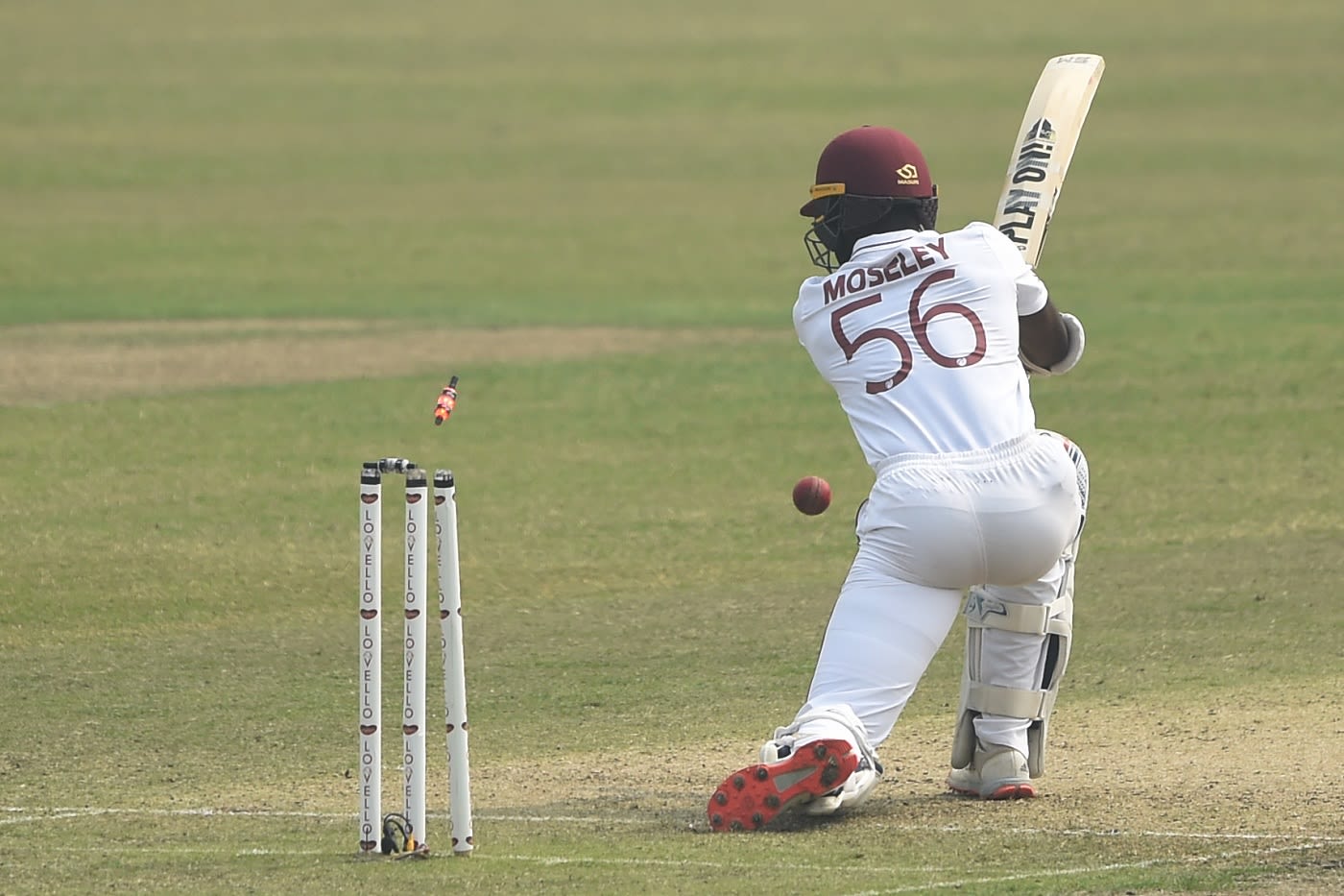 Shayne Moseley chases a wide one on to his stumps